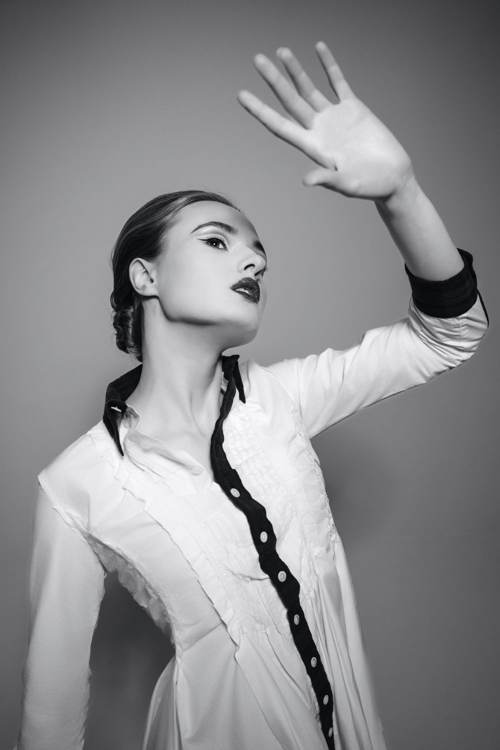 Black-and-white editorial fashion portrait